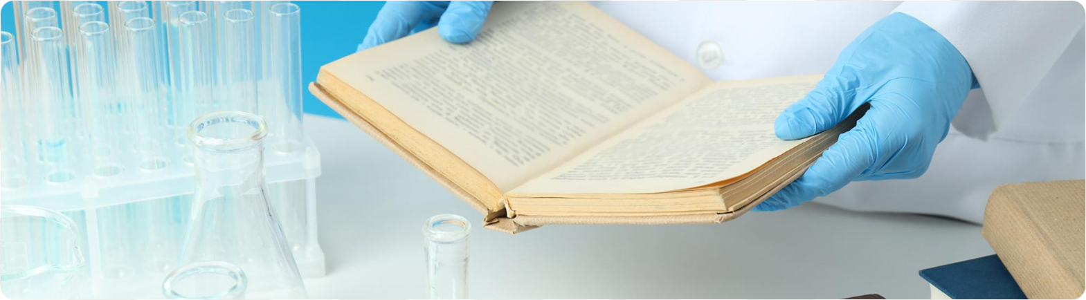 Scientist holding journal book